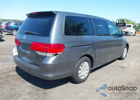 2010 Honda Odyssey Lx z USA, uszkodzony, nr VIN 5FNRL3H22AB046728